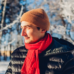 Man with anxiety looking off to the side, winter