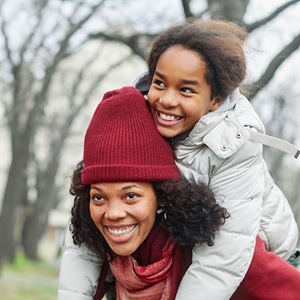 child on top of parent's shoulders, parenting skills